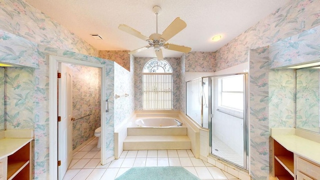 full bathroom with toilet, tile flooring, a healthy amount of sunlight, and ceiling fan