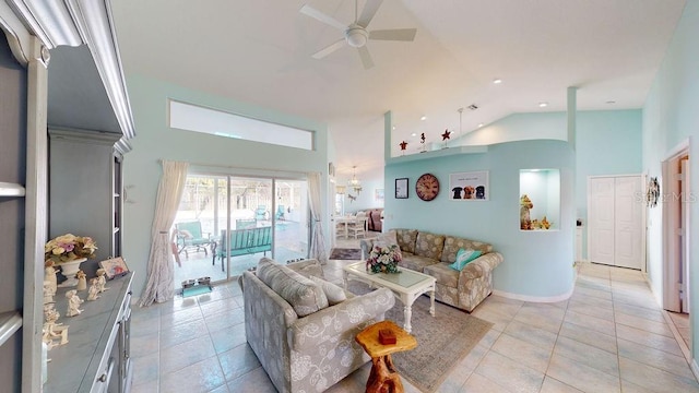 tiled living room featuring high vaulted ceiling and ceiling fan