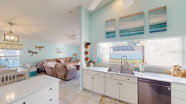 kitchen featuring light tile floors, ceiling fan with notable chandelier, white cabinetry, dishwasher, and sink