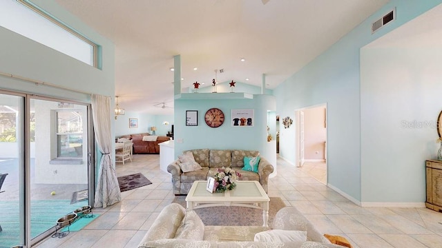 tiled living room with lofted ceiling