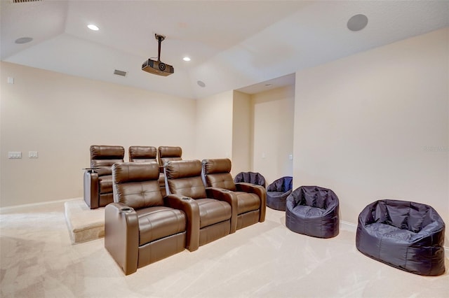 home theater with light carpet