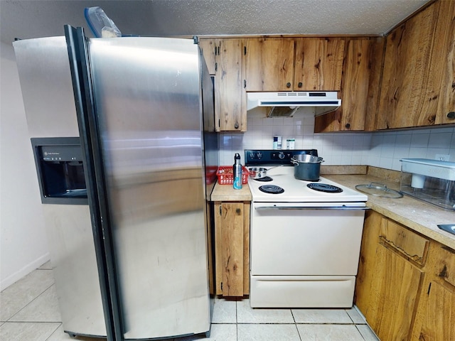 kitchen featuring stainless steel fridge with ice dispenser, backsplash, light tile floors, and white electric range