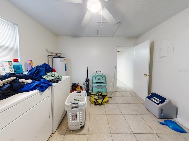 laundry area with electric water heater, light tile floors, washing machine and dryer, and ceiling fan