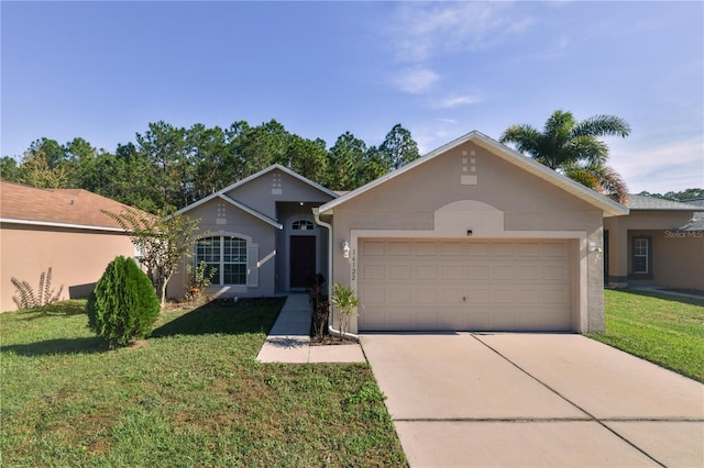 single story home featuring a front lawn and a garage