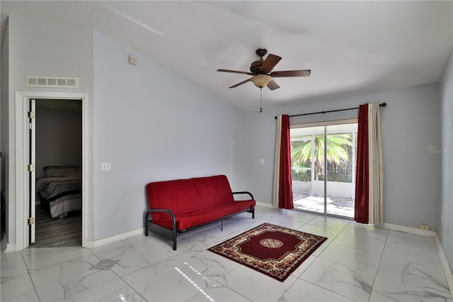 sitting room featuring light tile floors, high vaulted ceiling, and ceiling fan