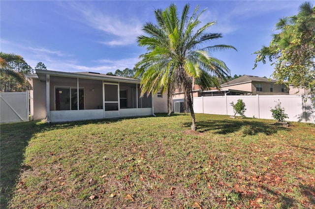 view of yard with a sunroom