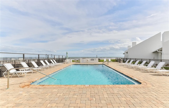 4875 S Atlantic Ave Unit E, New Smyrna Beach, FL 32169 - view of pool featuring a patio area