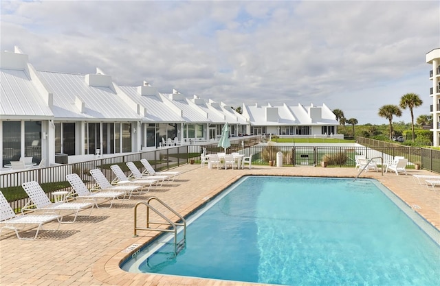 4875 S Atlantic Ave Unit E, New Smyrna Beach, FL 32169 - view of pool with a patio