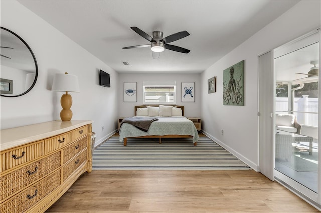 bedroom with access to exterior, ceiling fan, and light wood-type flooring