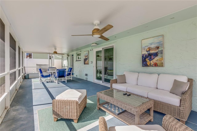 view of terrace featuring an outdoor living space and ceiling fan