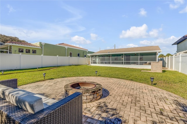 view of terrace with an outdoor fire pit