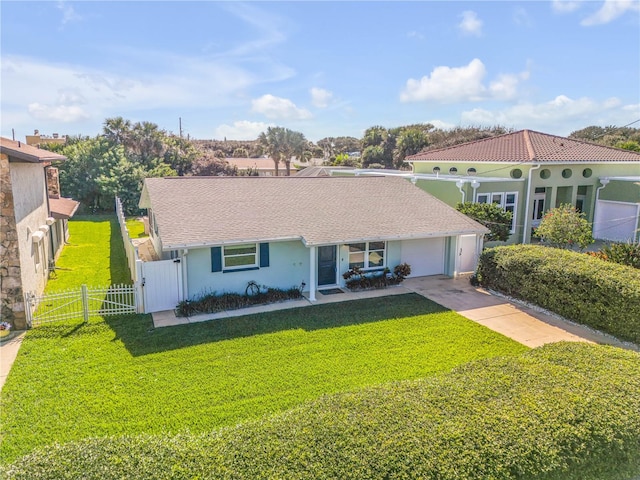 view of front of house with a front lawn and a garage