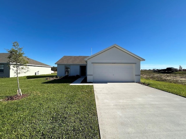 ranch-style house with a front yard and a garage