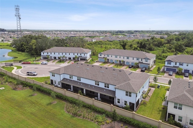 aerial view with a residential view and a water view