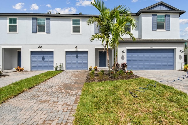 view of front of property with a garage