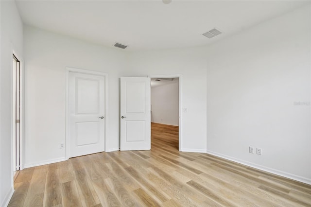 unfurnished bedroom with light hardwood / wood-style flooring