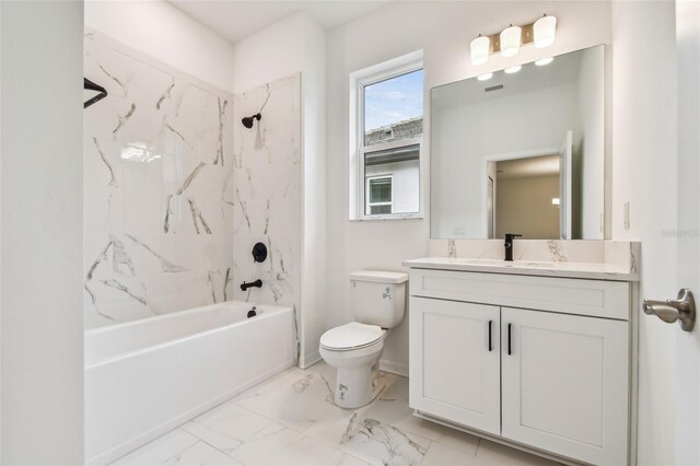 full bathroom featuring tiled shower / bath combo, tile patterned floors, toilet, and vanity