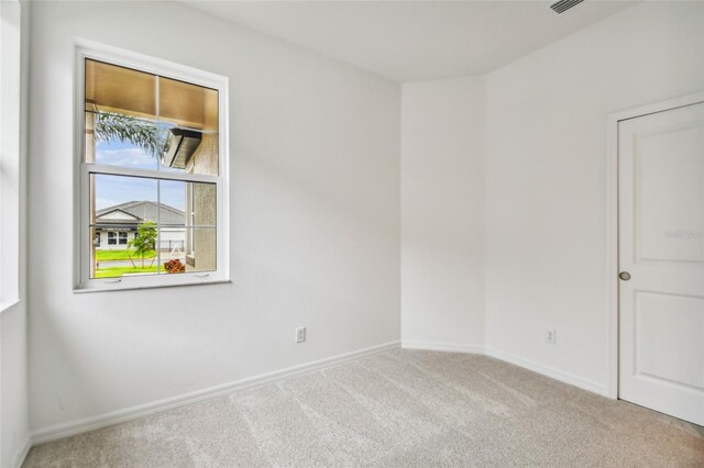 view of carpeted spare room