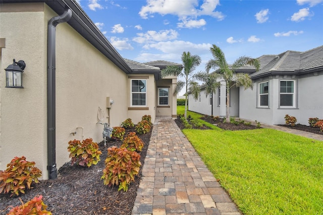 exterior space featuring a lawn