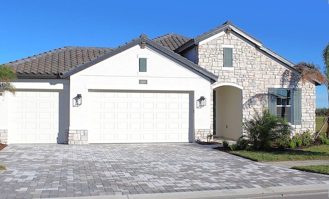 view of front of property featuring a garage