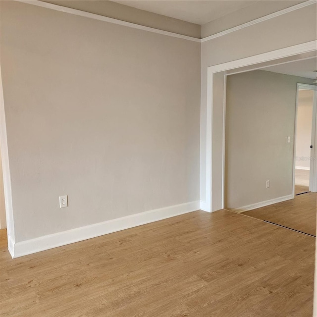 spare room with light hardwood / wood-style floors