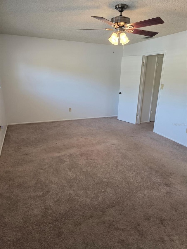 1019 Grove St Unit 85, Maitland, FL 32751 - carpeted empty room with a textured ceiling, ceiling fan, and baseboards