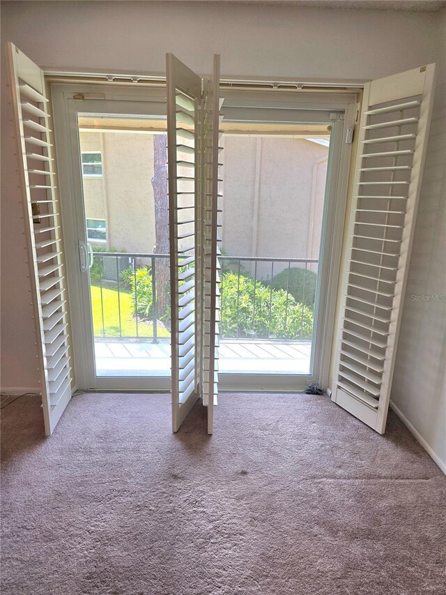 1019 Grove St Unit 85, Maitland, FL 32751 - doorway to outside with carpet