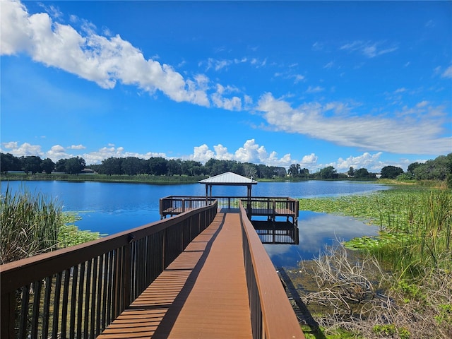 dock area with a water view and a gazebo