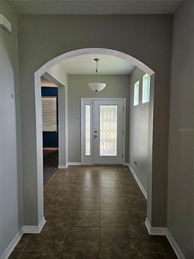 view of tiled foyer entrance