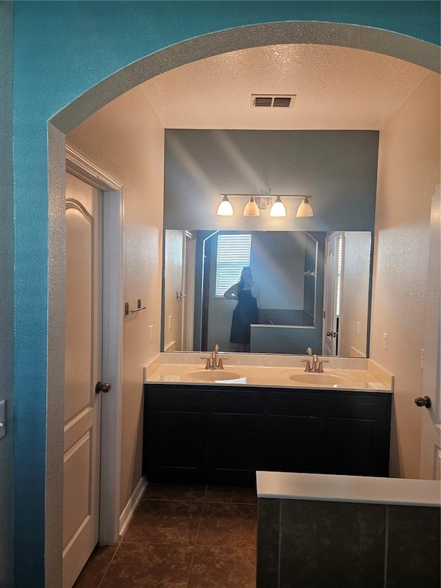 bathroom featuring vanity and tile patterned floors