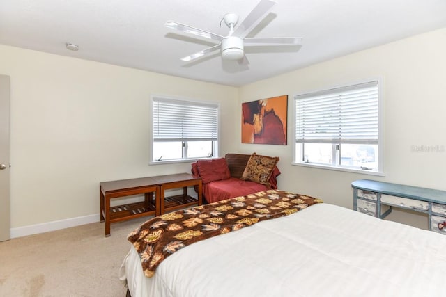 bedroom featuring ceiling fan and carpet floors