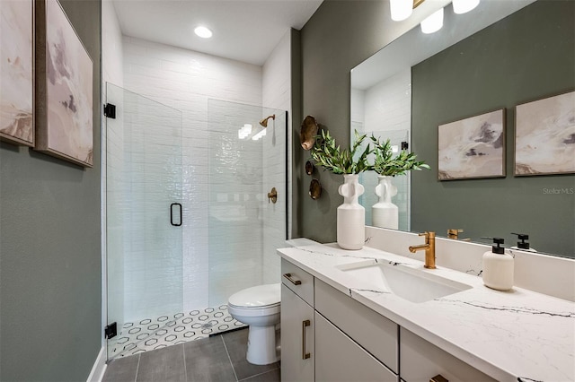 full bath featuring toilet, a shower stall, tile patterned flooring, and vanity