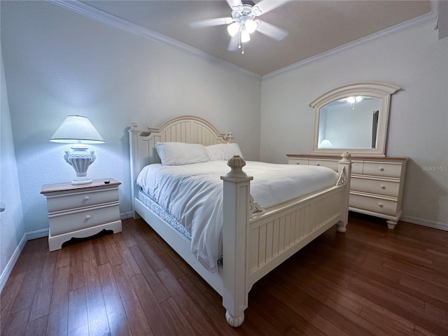 bedroom featuring ornamental molding, dark wood-type flooring, and ceiling fan