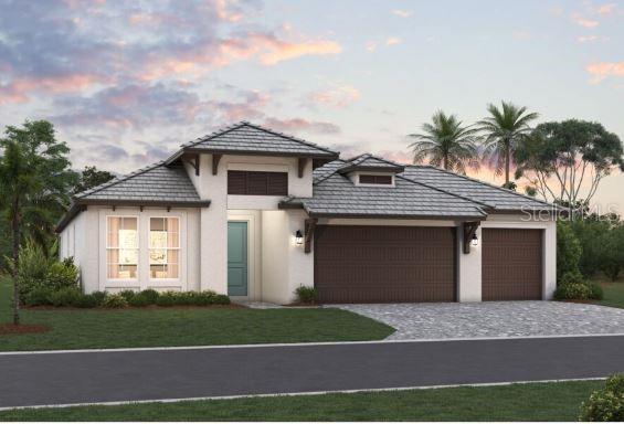 view of front facade featuring a garage and a lawn