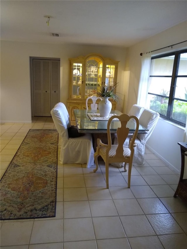 1608 Bob O Link Dr, Venice, FL 34293 - dining space with visible vents, baseboards, and light tile patterned flooring