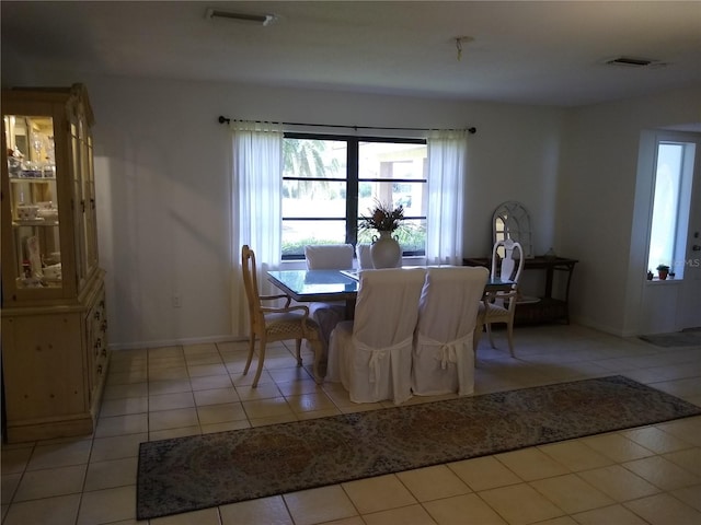 dining room with light tile patterned floors