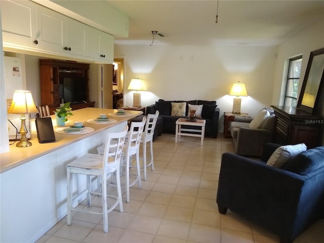 1608 Bob O Link Dr, Venice, FL 34293 - living room with light tile patterned floors and visible vents