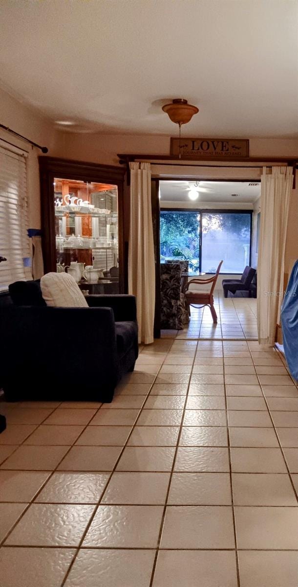 1608 Bob O Link Dr, Venice, FL 34293 - unfurnished living room featuring light tile patterned floors