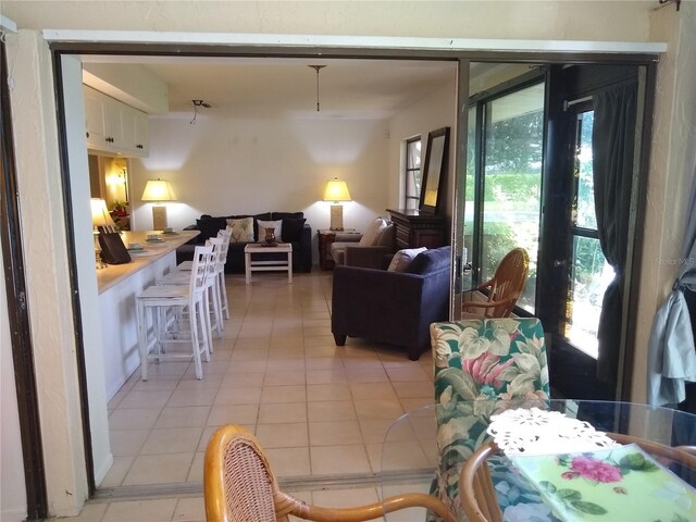 living room featuring light tile patterned floors