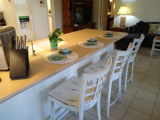 1608 Bob O Link Dr, Venice, FL 34293 - dining room with light tile patterned floors