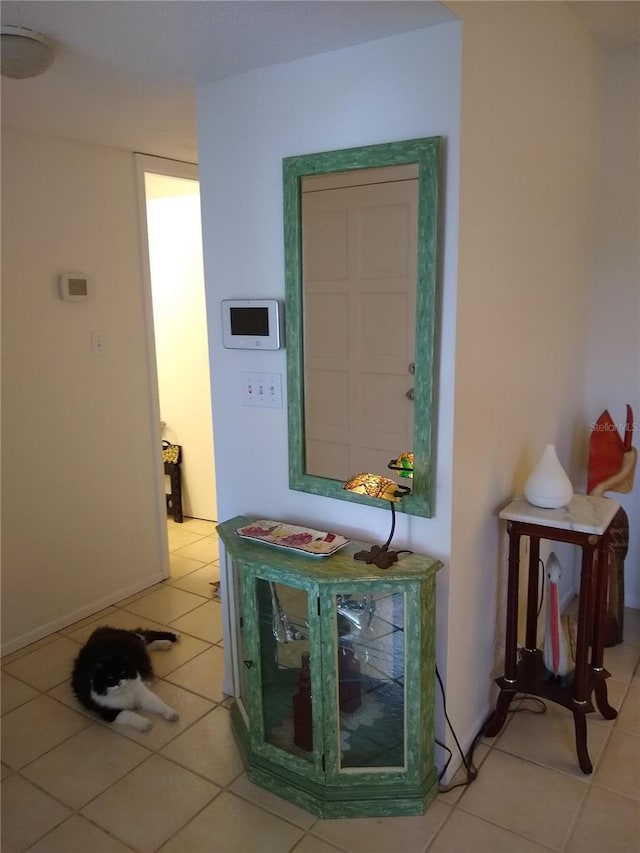 1608 Bob O Link Dr, Venice, FL 34293 - corridor with light tile patterned floors