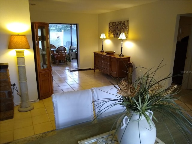 1608 Bob O Link Dr, Venice, FL 34293 - corridor featuring light tile patterned flooring and baseboards