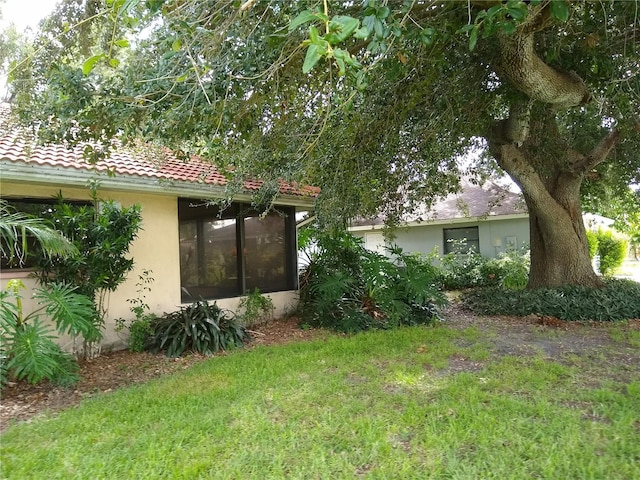 1608 Bob O Link Dr, Venice, FL 34293 - view of yard featuring a sunroom