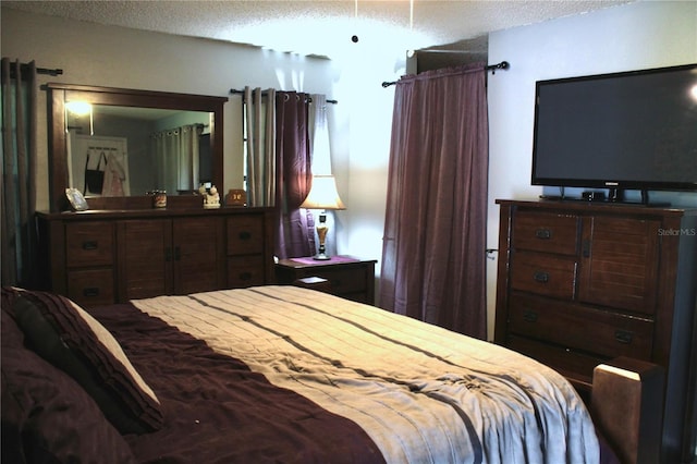 bedroom with a textured ceiling