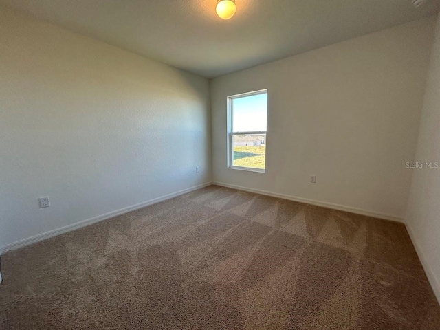 view of carpeted spare room