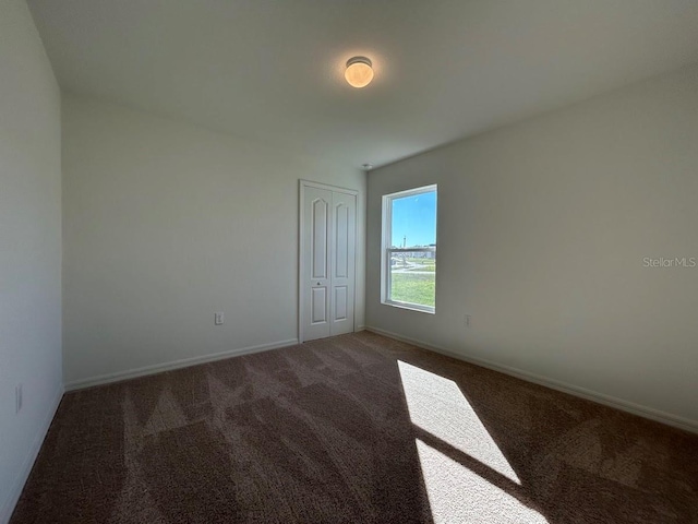 empty room with carpet floors