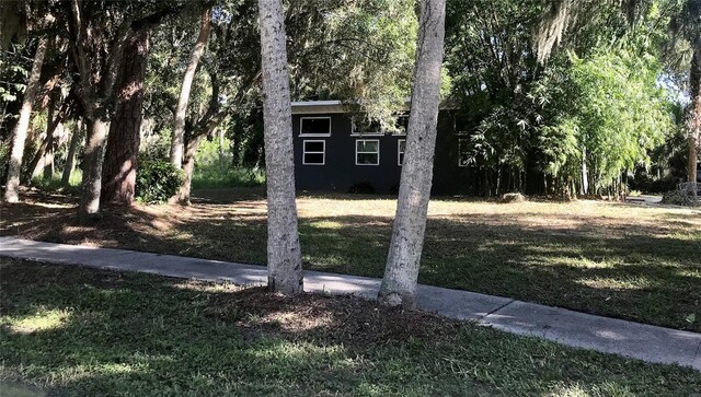 exterior space featuring a lawn