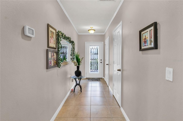 doorway with light tile patterned flooring and ornamental molding