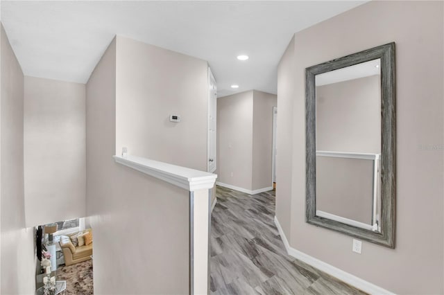 corridor featuring light hardwood / wood-style flooring