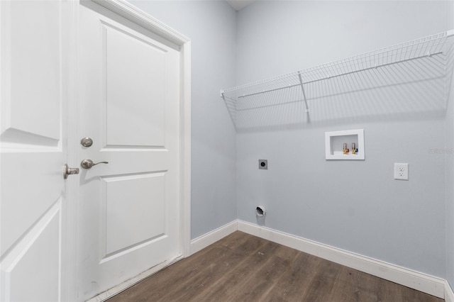 laundry area featuring laundry area, baseboards, dark wood-style flooring, hookup for a washing machine, and hookup for an electric dryer